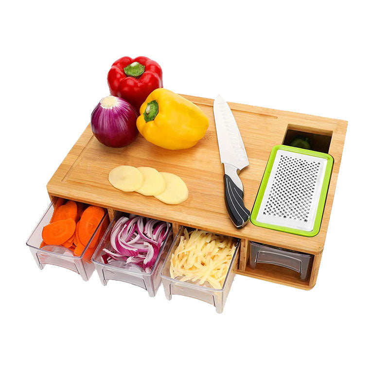 Wooden cutting board with knife, grater, and vegetable containers on a white background