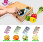 Vegetable grater with different attachments on a cutting board surrounded by vegetables.